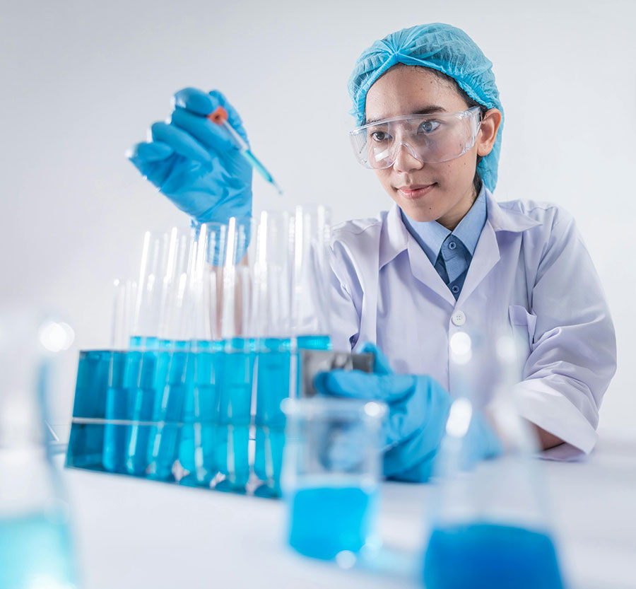 Scientist Looking at Vials